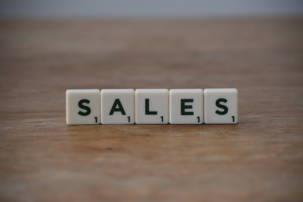 Sales Word on Wooden Table